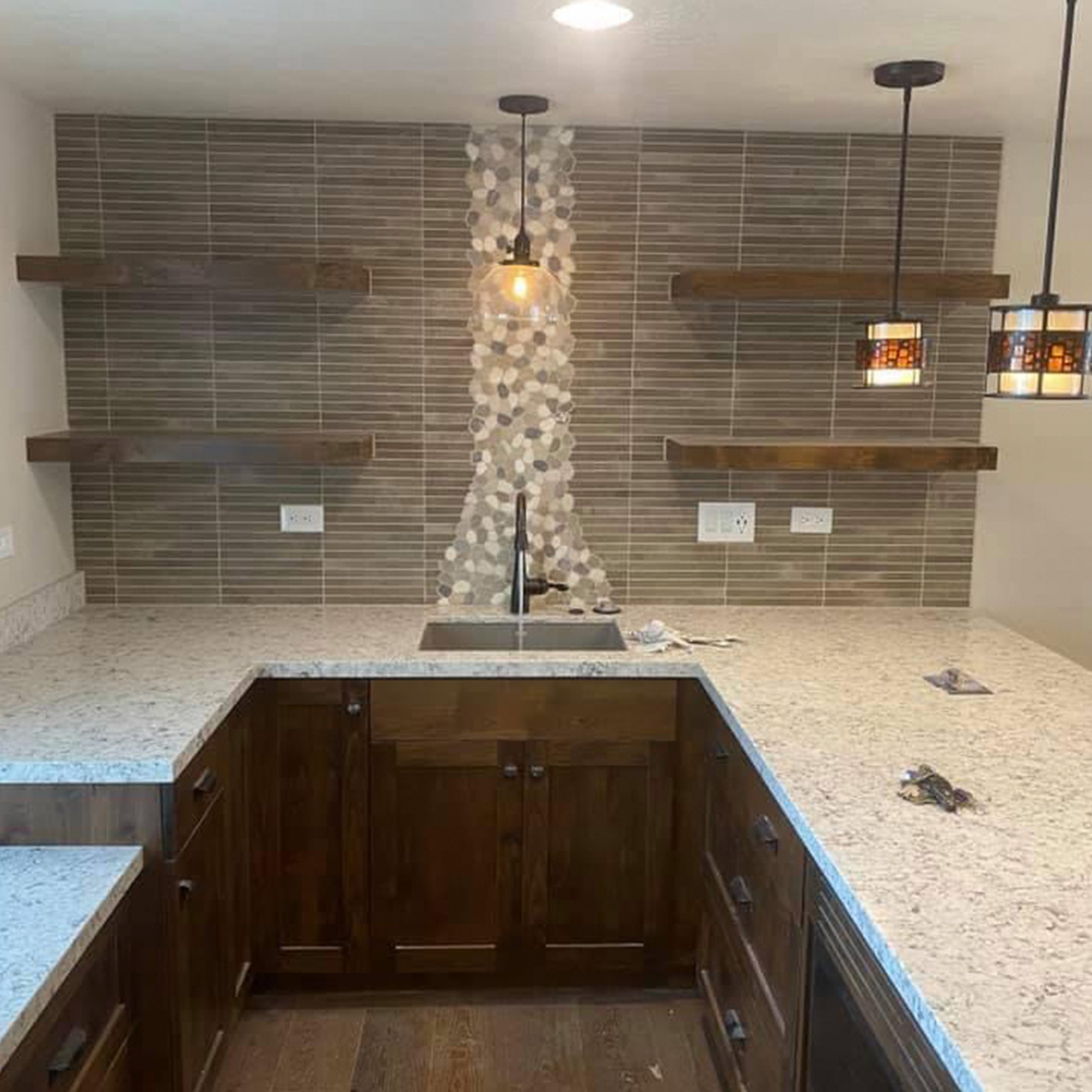 Utah Basement Finishing Contractor's bar kitchenette featuring sink and counter top