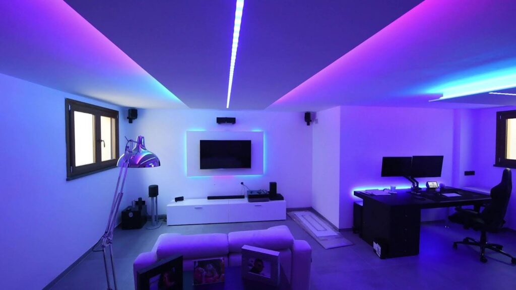 A room illuminated with vibrant purple and blue lights creating a dynamic and colorful atmosphere